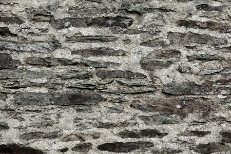 A stone wall texture background from a farmhouseの写真素材