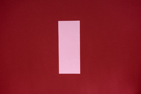 How to make a paper bookmark for congratulations, confession in lovein and fun on Valentine's Day. DIY concept. Step by step photo instructions. Step 2. Cut out a rectangle 15 by 7cm. Photo of a blank red stop sign with no text letters.の写真素材