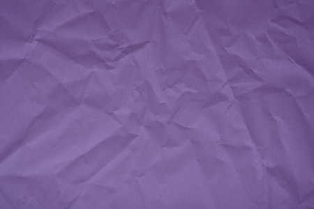 Abstract violet paper wrinkled or crumpled texture background close-up top view, violet texture,...