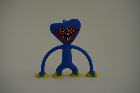 Blue monster chef holding on to the ground