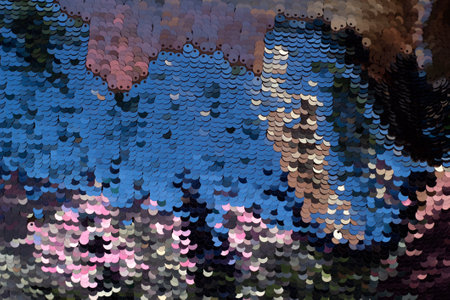 Abstract cute background multicolored iridescent sequins sequins.の写真素材