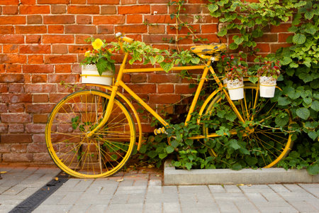 old retro bike on the background brick wall.の写真素材