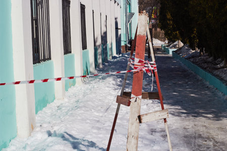 Guardrail stretched red striped tape no entry.の写真素材