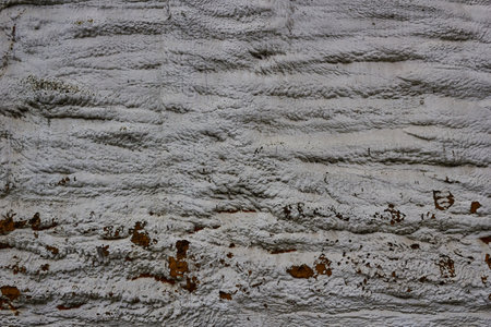 Abstract white background with reddish rough surface.の写真素材