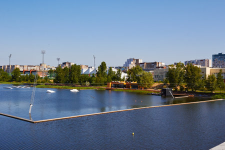 lake in middle of high-rise buildings water sports