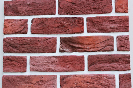 Photo texture red brick and white seams.の写真素材