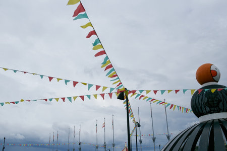 developing flags in the sky on a string. Windy