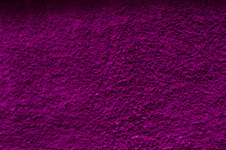 textured plaster burgundy background texture. An abstractの写真素材
