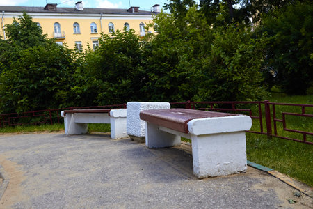 old concrete benches in the yard. a place for