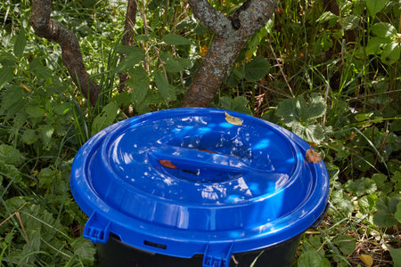 The plastic blue lid of the composting tankの写真素材