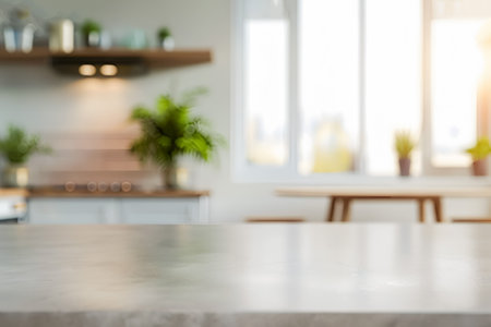 Modern kitchen counter with marble top and copy space. Slightly blurred backgroundの素材