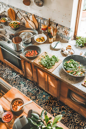 Modern kitchen with vegan food being cookedの素材