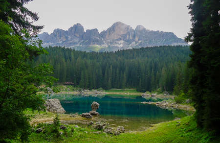 Crystal clear waters of Lake Carezza - Trentino South Tyrol