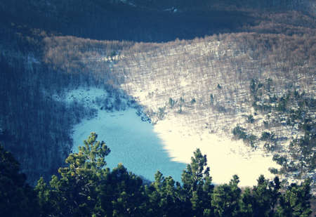 Lake Nero   North Italy   covered by ice and Snowの写真素材