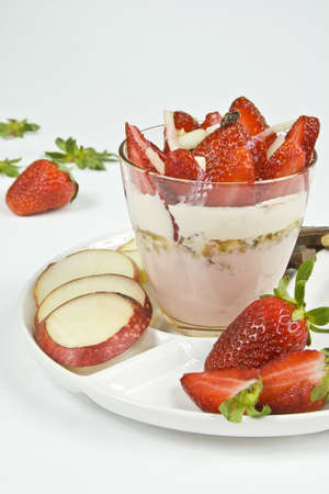strawberry dessert with peaches and creamの写真素材
