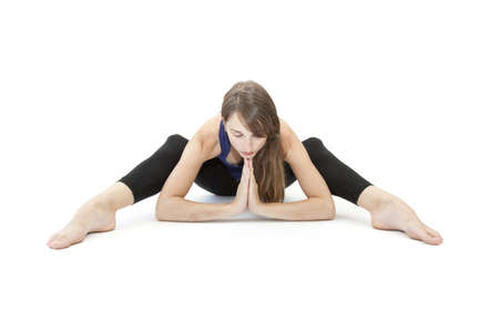 Posture of the vulture made by a young womanの写真素材