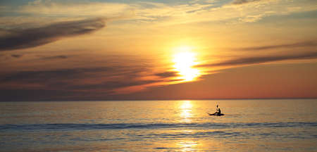 Sunset over the oceanの写真素材
