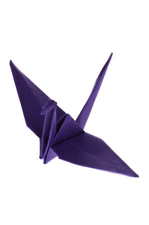 A purple Origami Crane isolated on white backgroundの写真素材