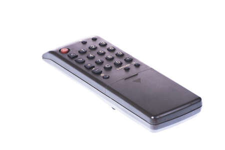 Black old  TV remote isolated on white backgroundの写真素材