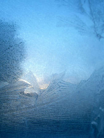 Frosty pattern at a window. Sunsetの写真素材