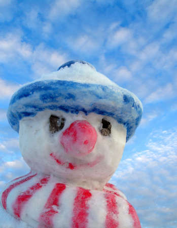Snow man and blue skyの写真素材