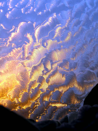 Frosty natural pattern on winter windowの写真素材