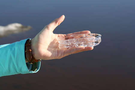 Ice in hand of girlの写真素材