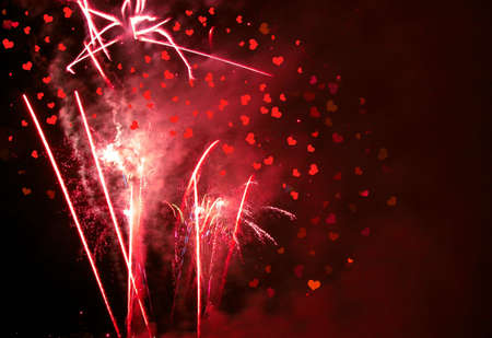 Celebratory Firework with heartsの写真素材