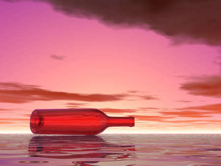 Lonely bottle in sea. Sunset.の写真素材