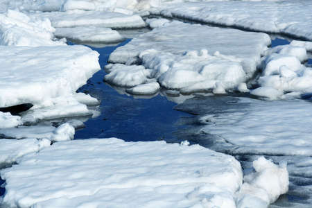 Drifting Ice on riverの写真素材