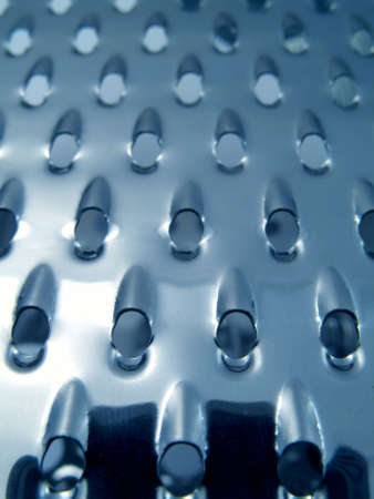 Texture of steel grater close-upの写真素材