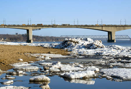 Bridge . Spring.  Drifting Ice on river Volga.の写真素材
