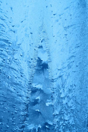 Frosty pattern at a window. Natural backgroundの写真素材