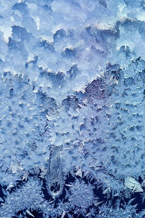 Frosty pattern at a window. Natural backgroundの写真素材