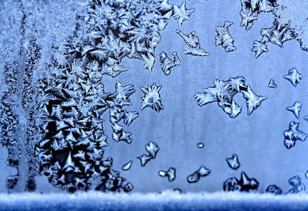 Frosty pattern at a window. Natural backgroundの写真素材