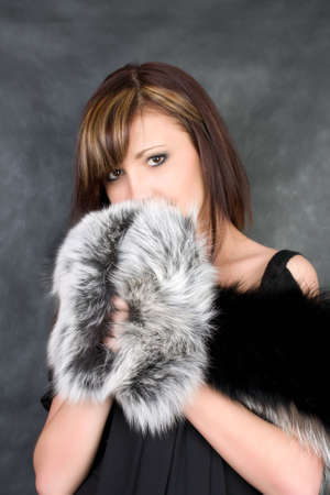 Charming young woman. Fashion studio portraitの写真素材