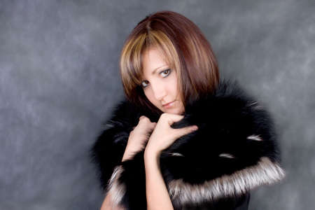 Charming young woman. Fashion studio portraitの写真素材