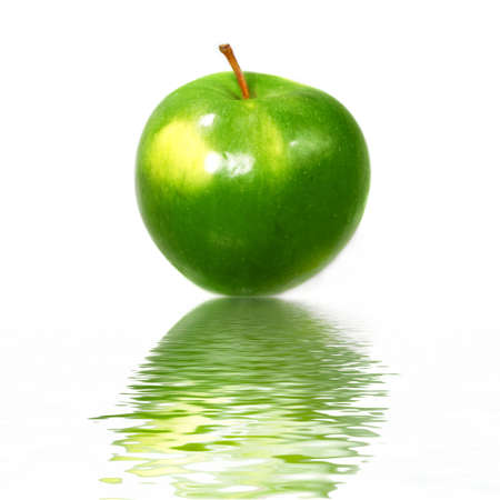  Apple  reflected  in waterの写真素材