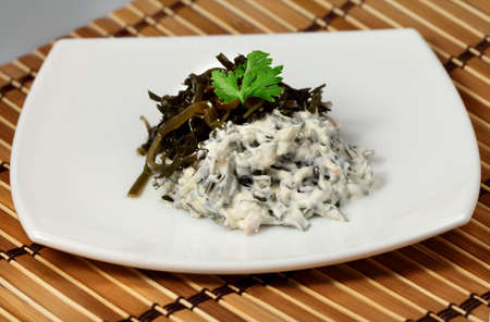 Different appetizing dietetic  salads of laminaria の写真素材