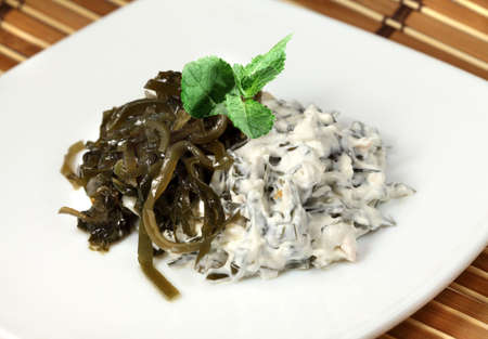 Different appetizing dietetic  salads of laminaria の写真素材