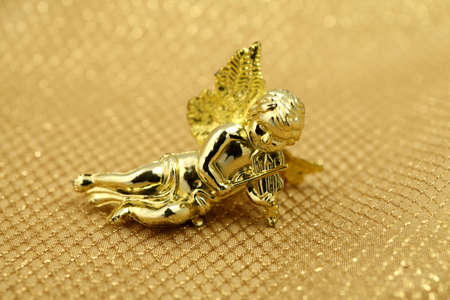 Christmas decoration - golden angelの写真素材