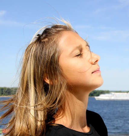  Portrait of the  beautiful girl in a natural environmentの写真素材