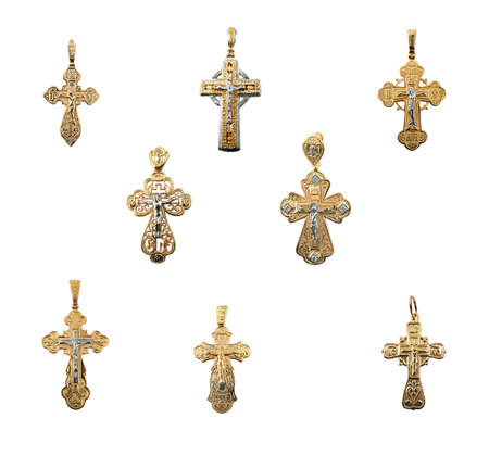 Set of golden jewelry crosses
