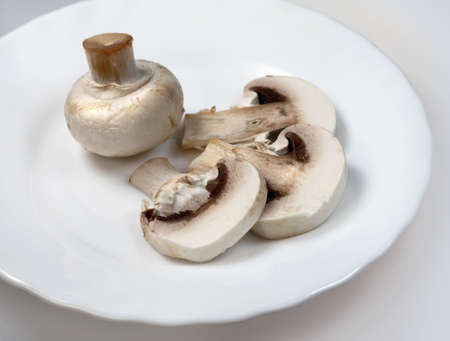 Vegetable mushrooms champignon Agaricus on plateの写真素材