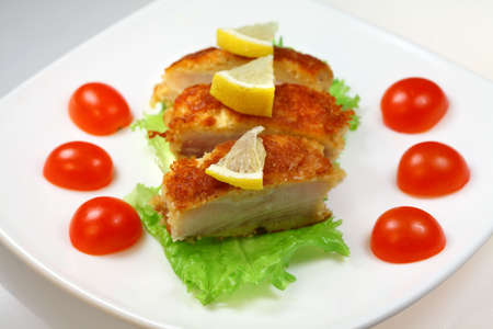 Roasted sea fish with lettuce and  Cherry tomato