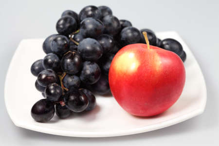  Hand of ripe sweet grape for dessertの写真素材