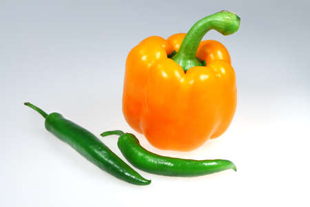 Paprika and green cayenne on a white backgroundの写真素材