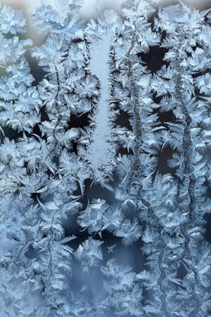 Frosty original  pattern at a winter window glass, natural texture
