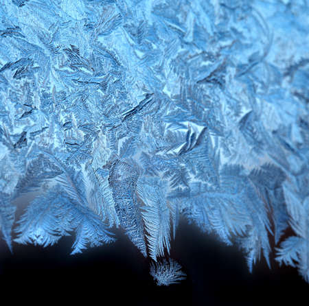 Frosty original  pattern at a winter window glass, natural texture
