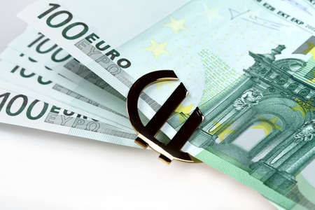 The money euro. Bundle of bank notes  and golden signの写真素材